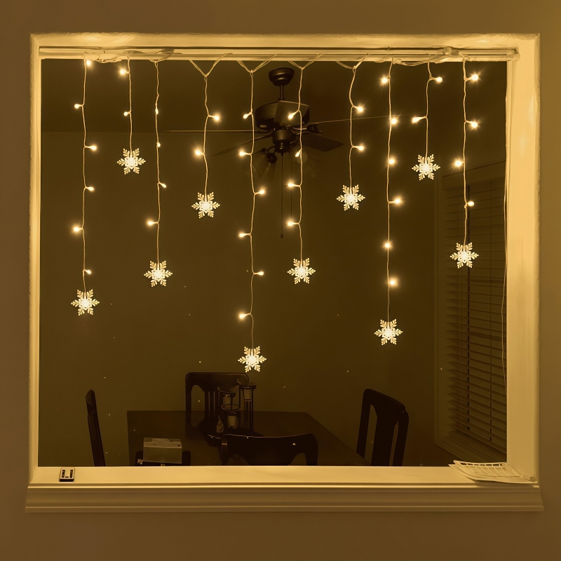 أضواء ستارة على شكل ندف الثلج  - مراجعة Outdoor Solar Power Xmas Lights وسعره